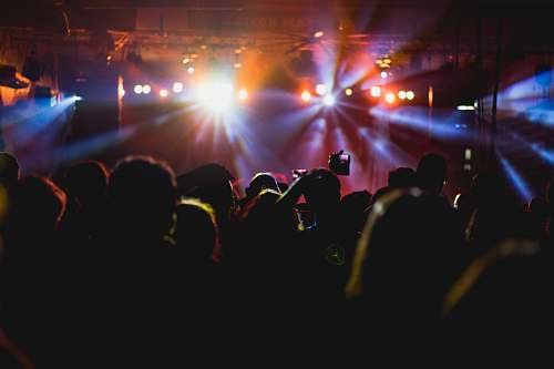leisure activities people enjoying concert lighting
